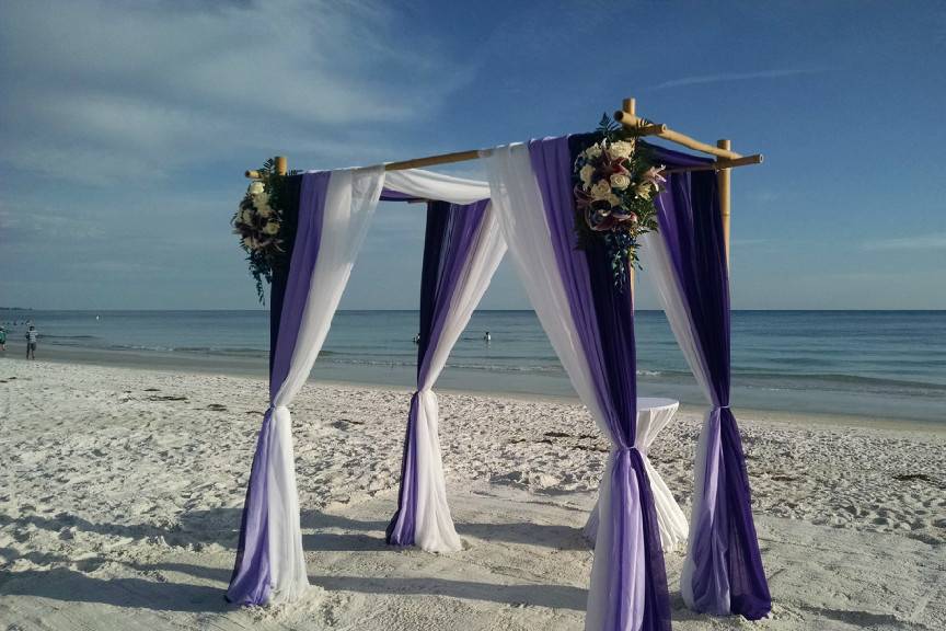 Violet and white wedding arbor