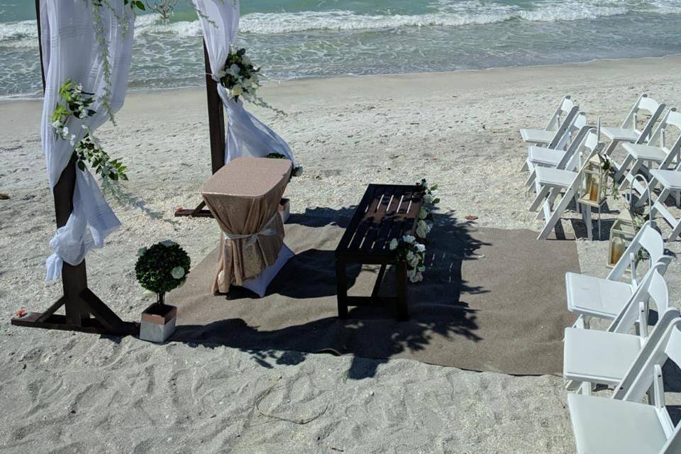 Beach Side ceremony and floral pergola