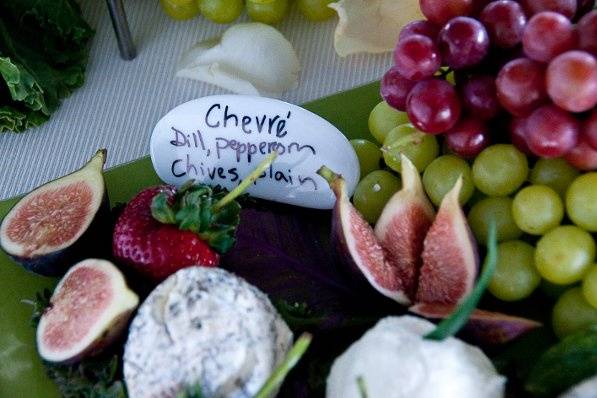 Cheese Table with fresh Figs, Chevre, and red & green grapes