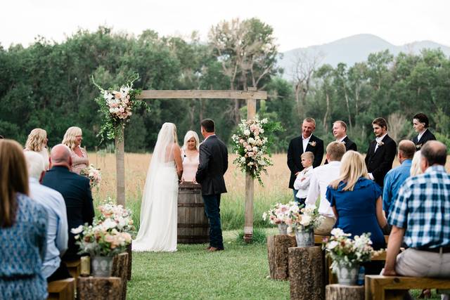 Rustic florals at the altar