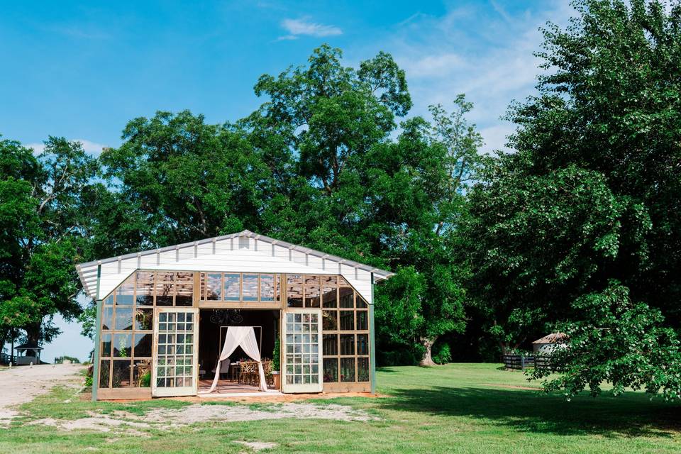 Conservatory and tack barn