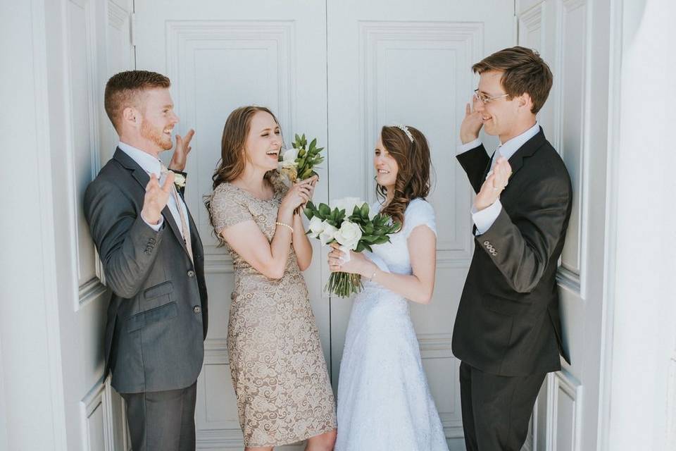 The couple with their bridesmaid and groomsmen