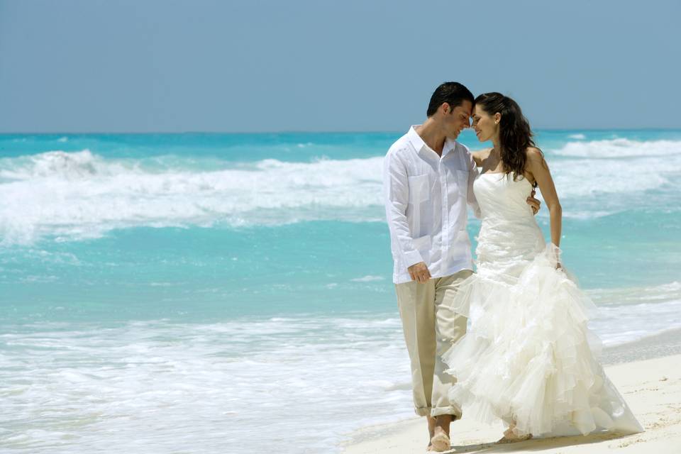 Newlyweds along the shore