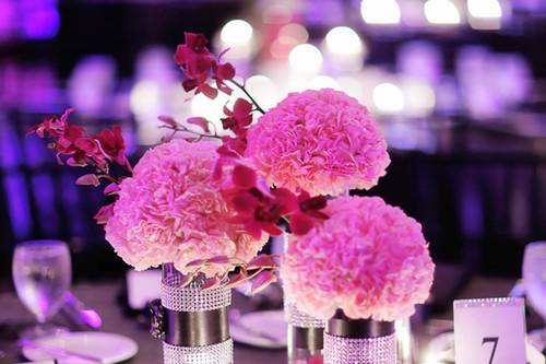 Table setting with floral and candle centerpiece