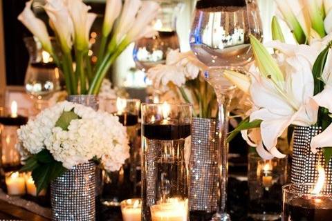 Table setting with floral and candle centerpiece