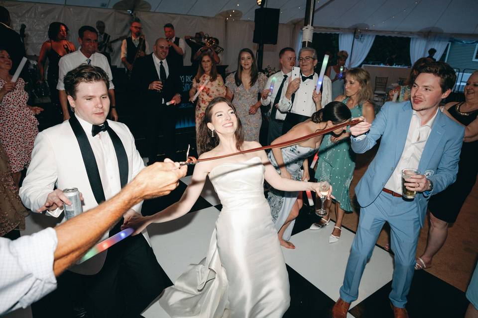 Newlyweds doing the limbo