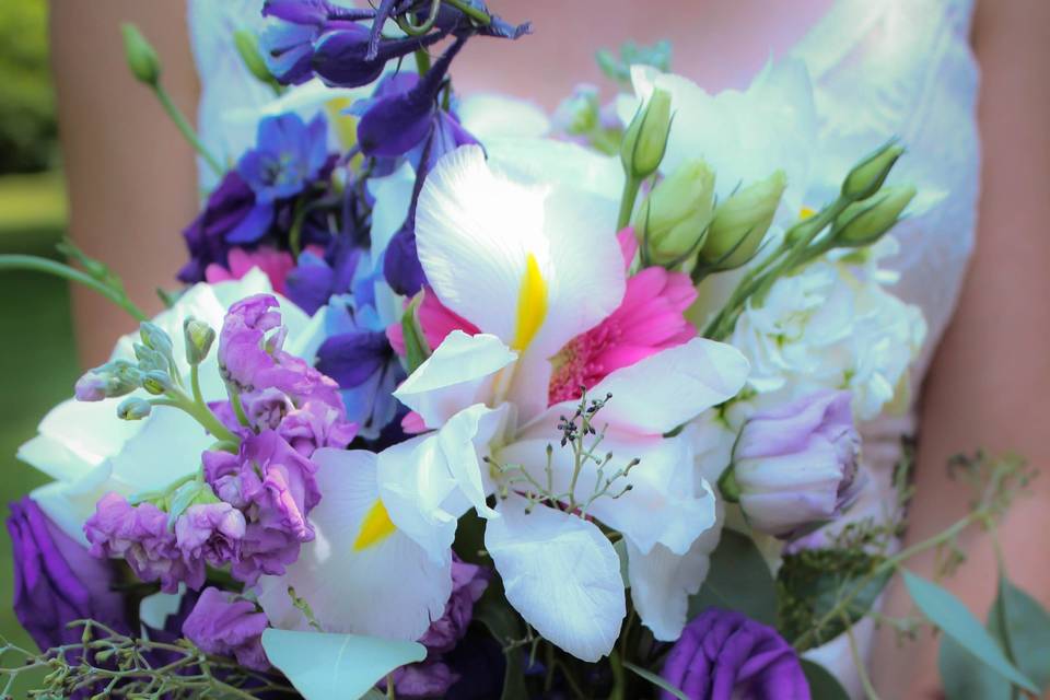 The bouquet with purple and white flowers