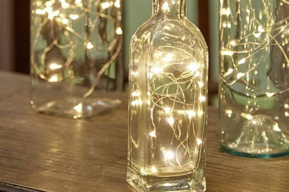 Wine bottles with fairy lights