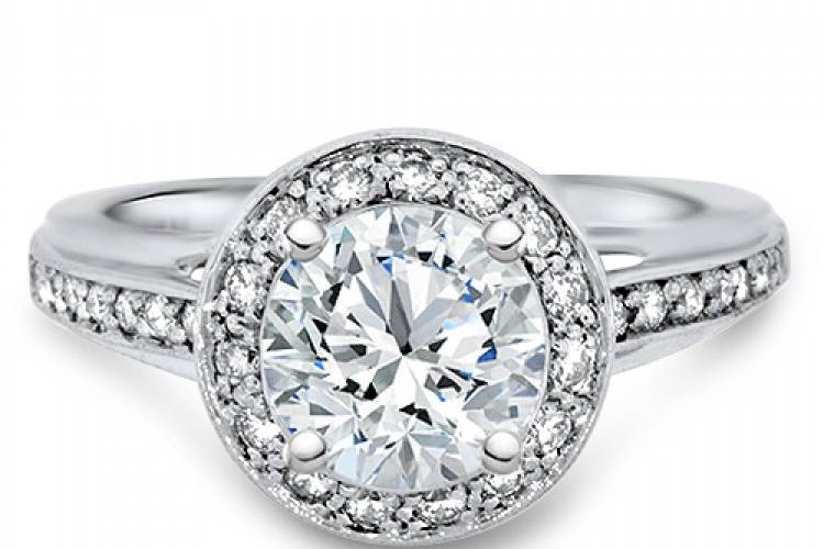 Halo engagement ring with bezel edge.