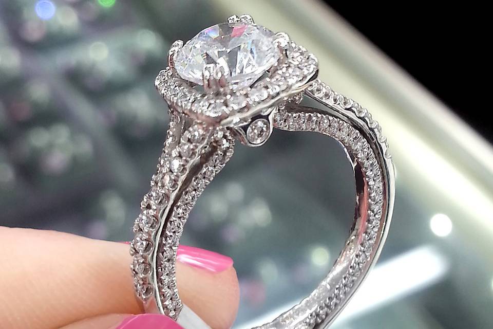 Cushion halo engagement ring from Verragio with intricate detailing.