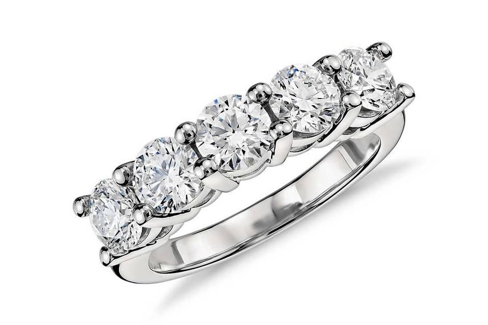 Classic five-stone wedding band. Also a best-selling anniversary present!