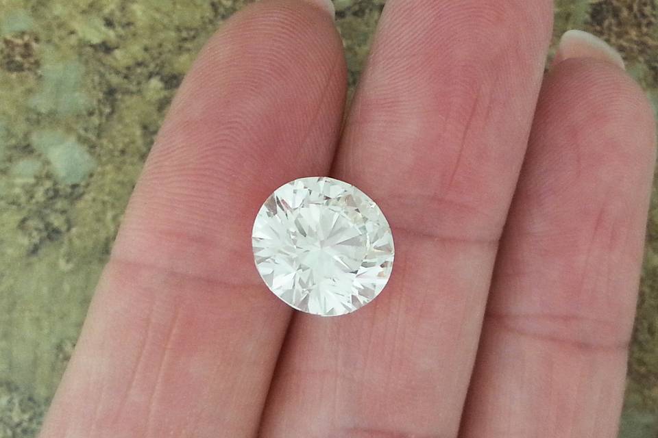 A flawless, colorless round brilliant diamond, about 3 carats. Would make a stunning solitaire engagement ring.