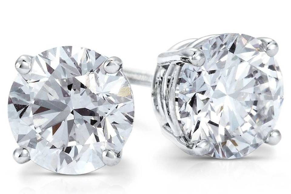 Classic diamond studs are fail-proof wedding day earrings.