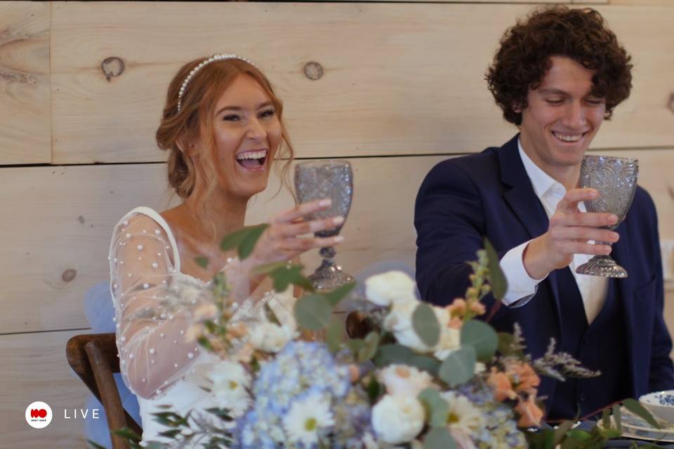 Young Newlyweds Share Toast