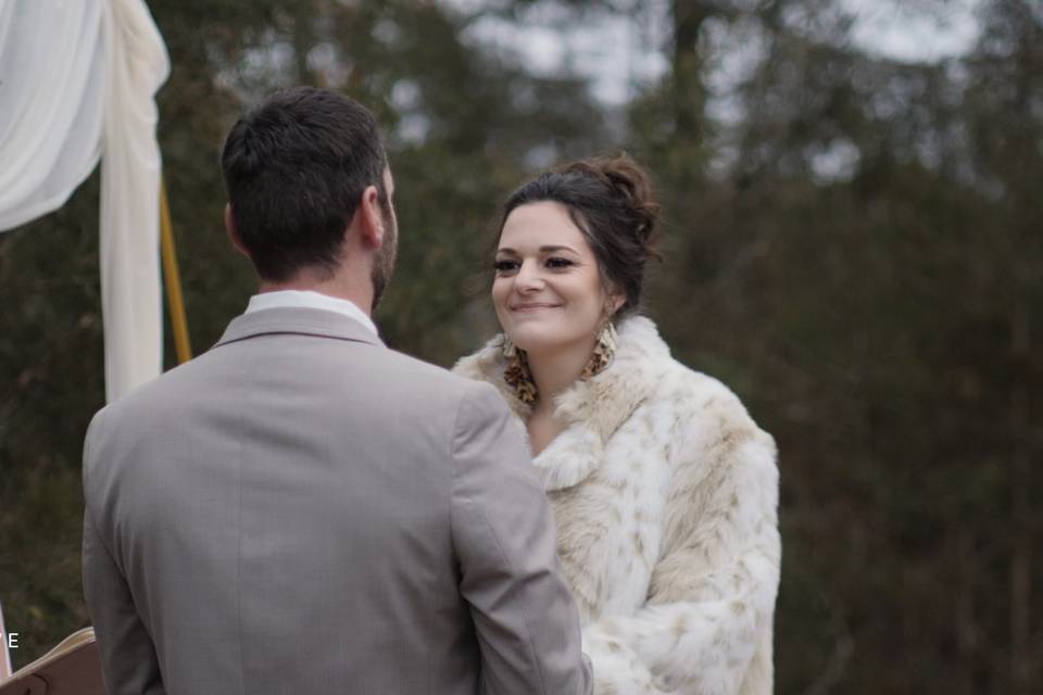 Bride Looks Lovingly at Groom