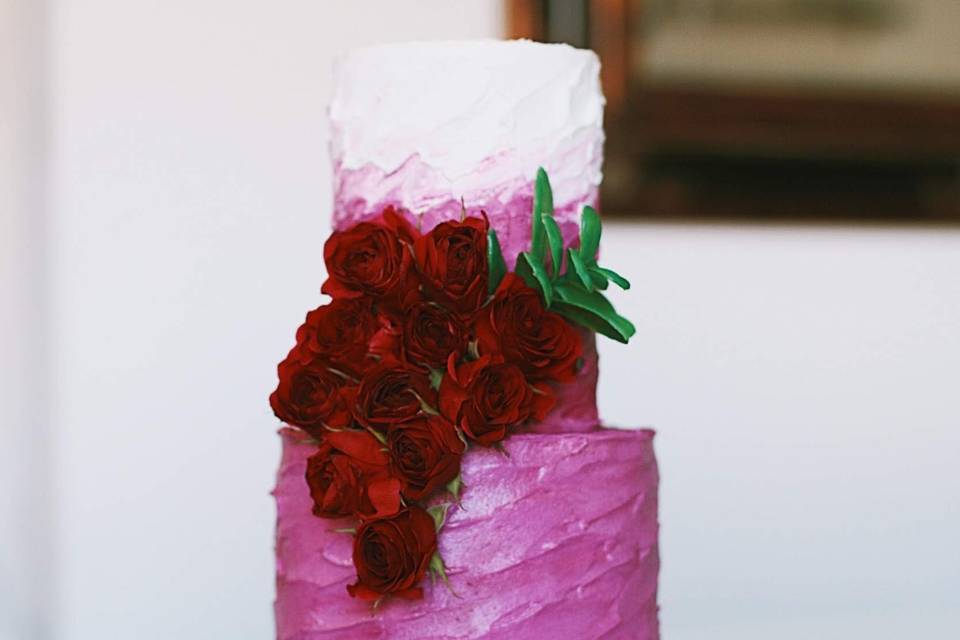 Two-tier pink and white cake