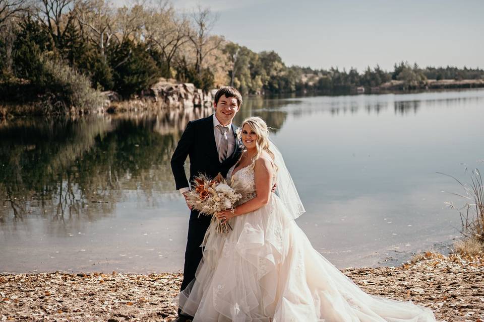 Bride and groom at lake