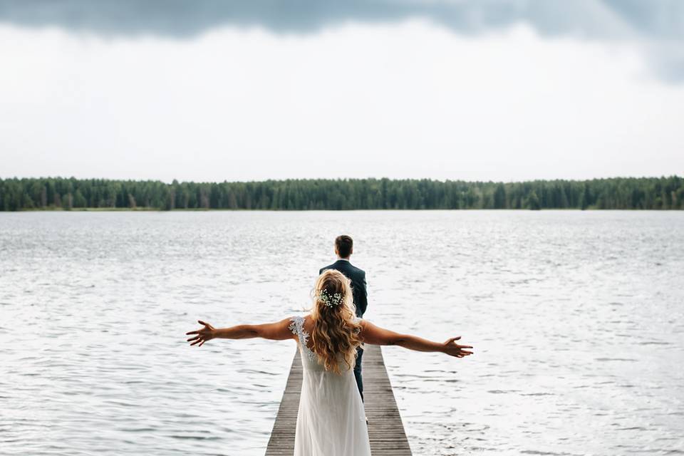 Bride on lake dock