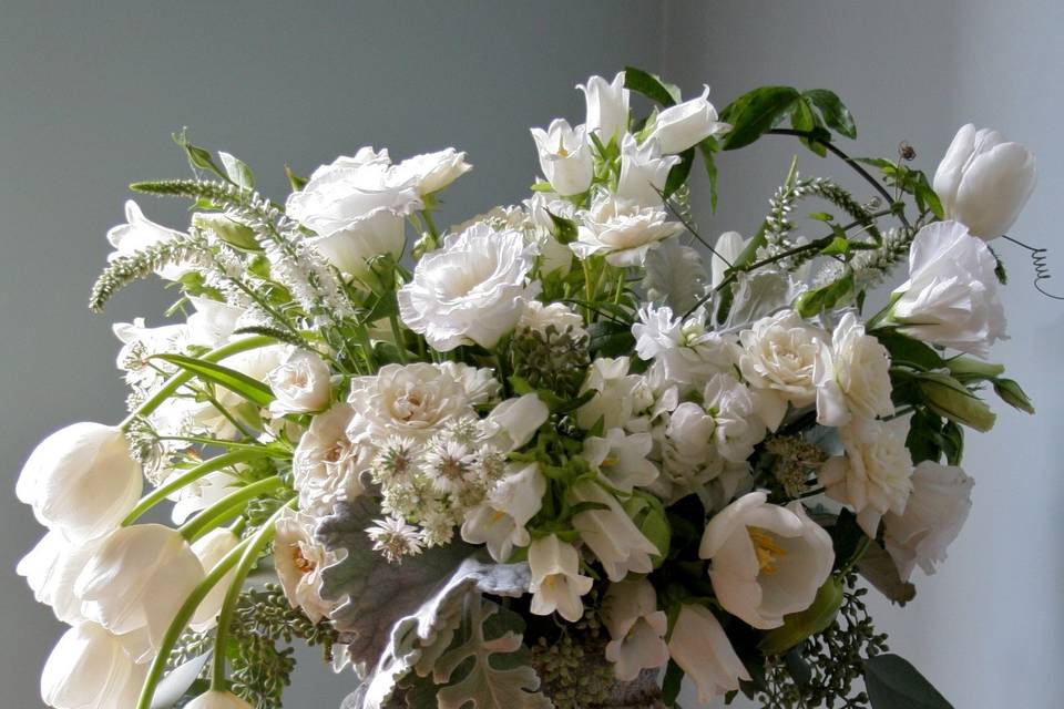 White Perfection in an old urn.  Free flowing and full of sophistication by White Magnolia Designs.