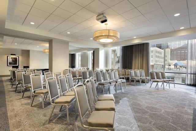 The Grant Ballroom features floor-to-ceiling windows for a light and airy wedding ceremony.