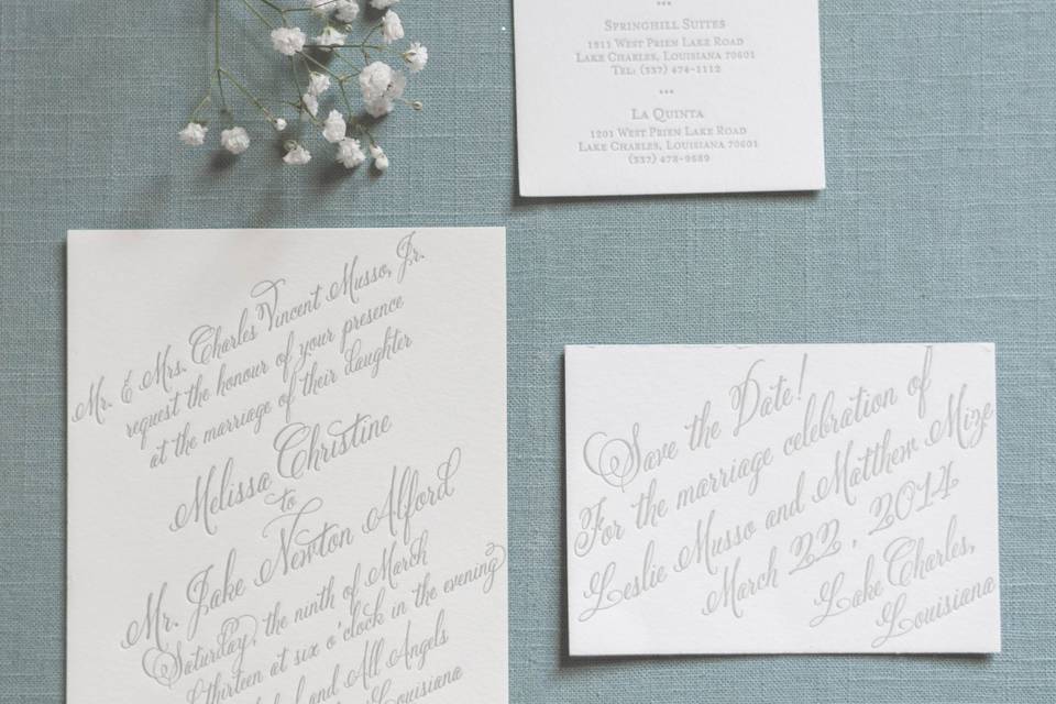 Styled invitations on blue