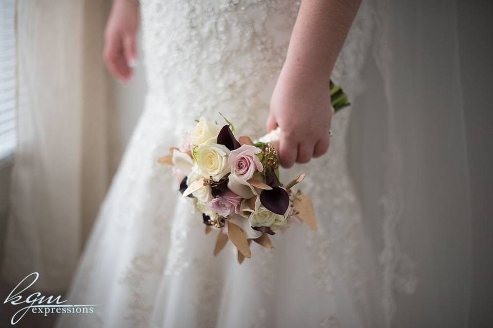 Bride's bouquet in hand