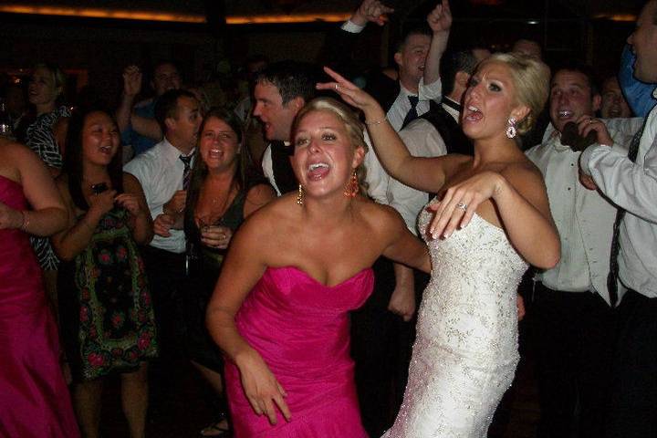 Bride and her guests dancing
