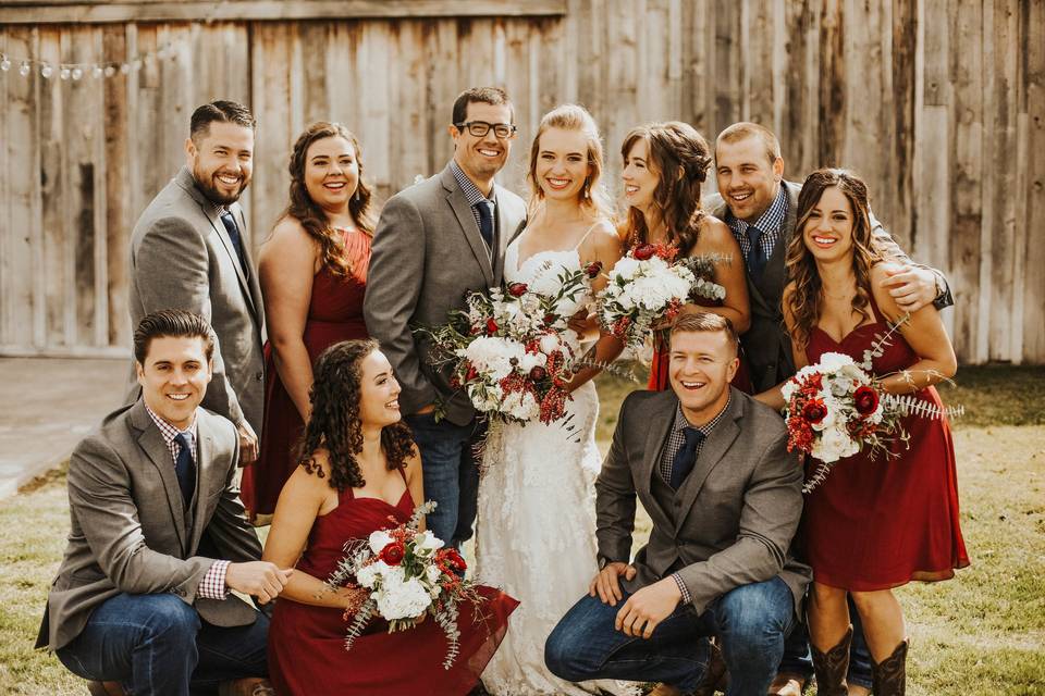 The newlyweds with the wedding attendants