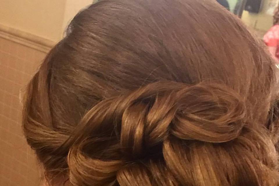 One of the #bridesmaidshair from today's #dovecanyongolfclub @dovecanyongc wedding. Love working at this venue so close to home. #Sidedo #sidebun #sidebunwithbraid #lisaleming #ocbridalhairmu