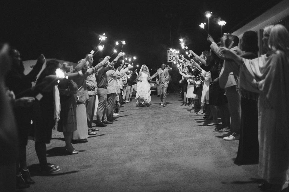 The couple arriving at the reception