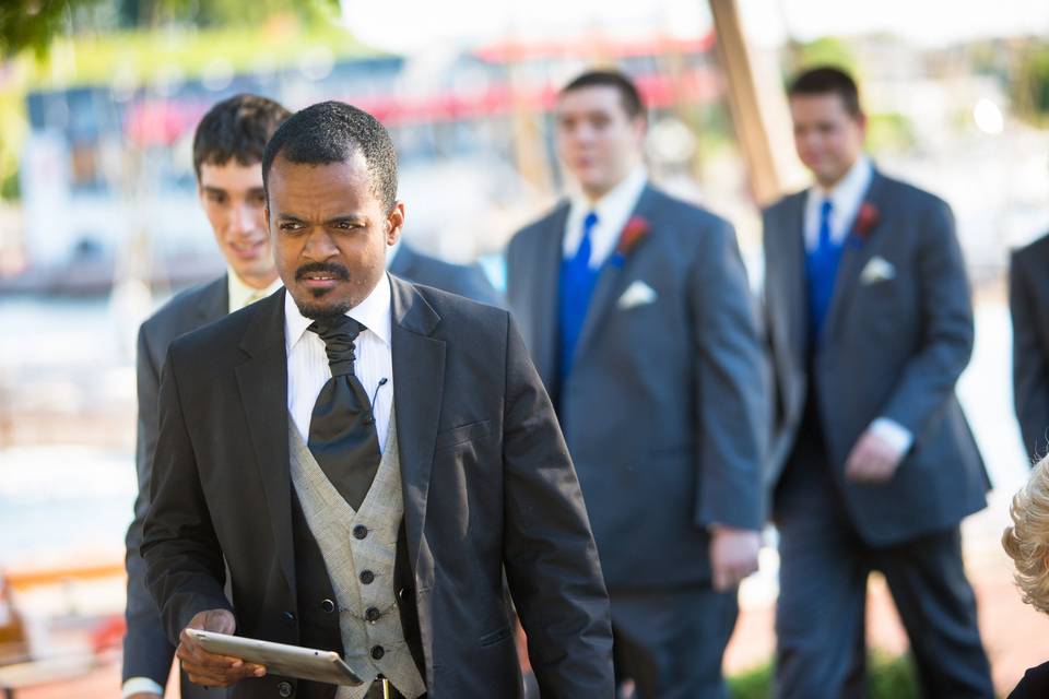 Groomsmen and pastor