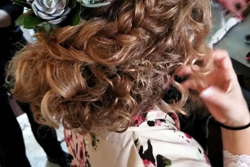 Natural curly hair updo on bride