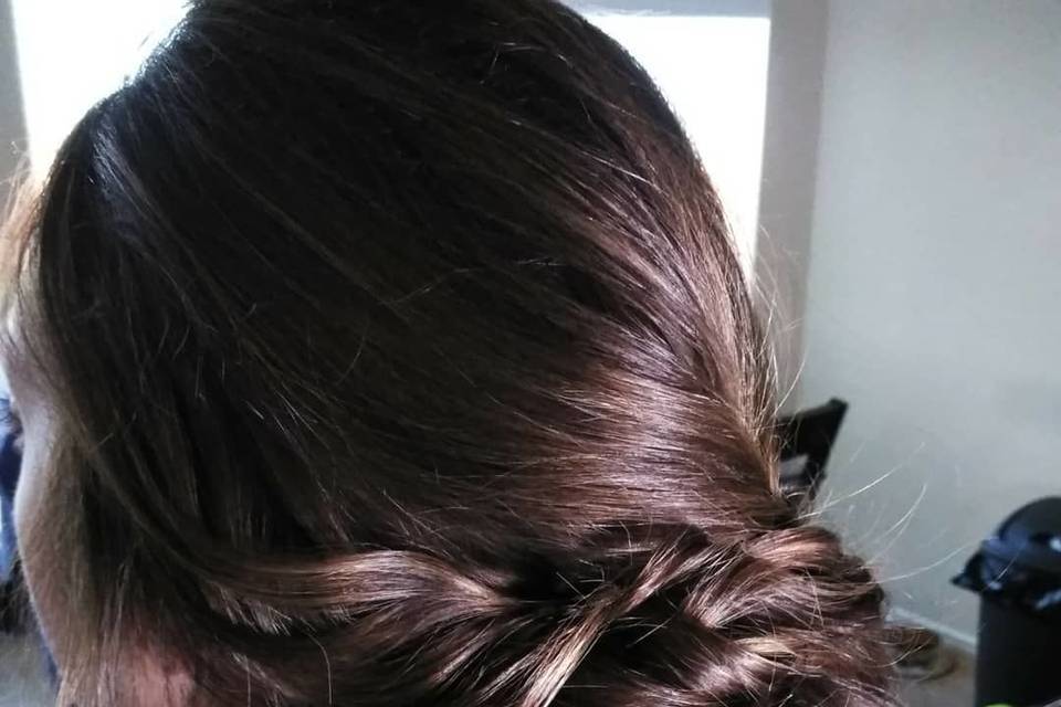 Natural curly hair updo on bride