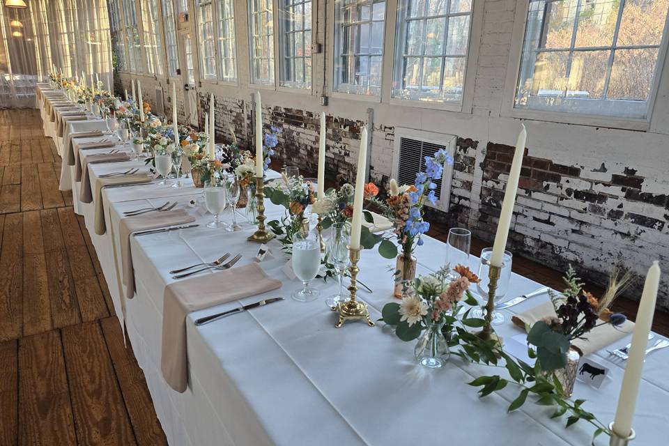 Bud vases and brass candles