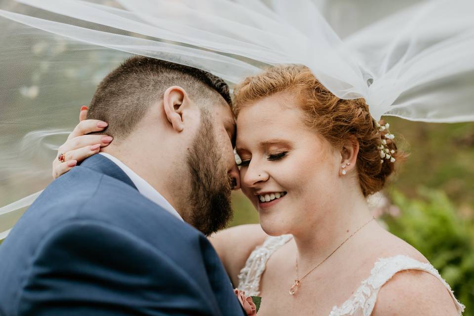 Romantic moment under veil