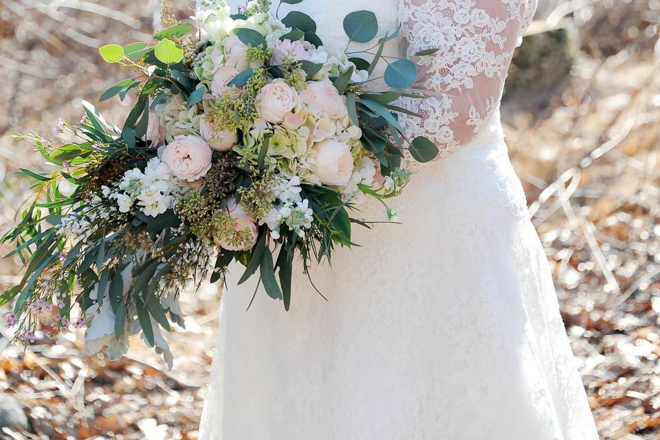 Bride in a lace sleeved dress