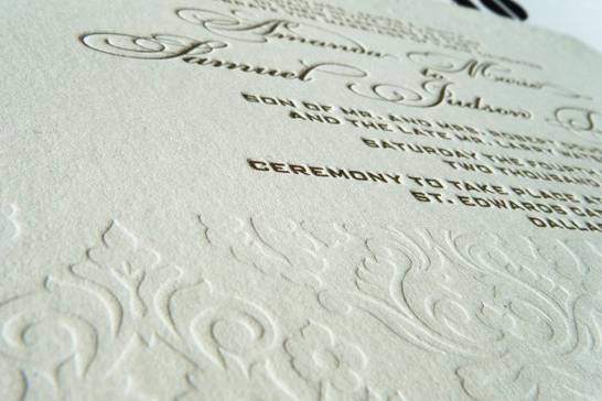 This invitation is printed with metallic gold and a blind letterpress to give it an understated elegance.