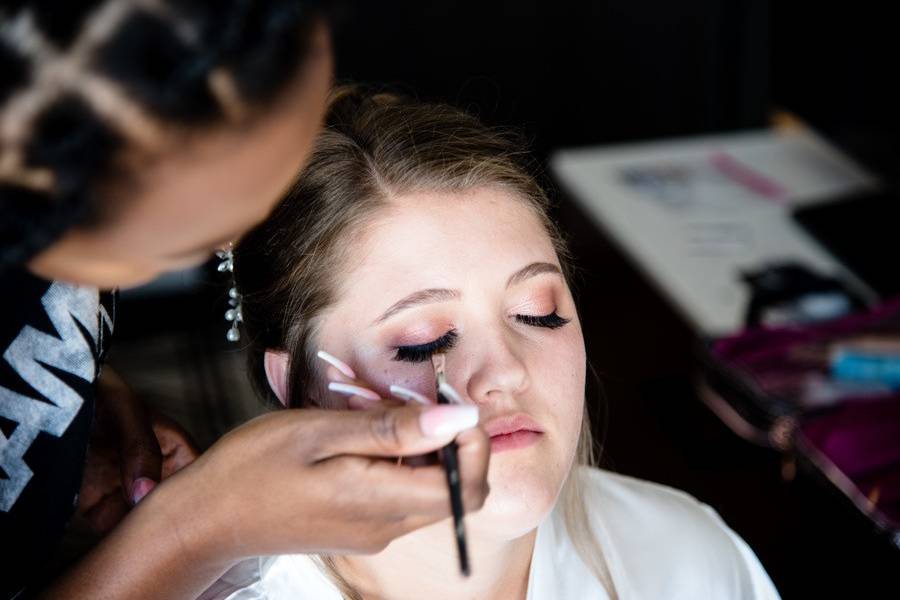 Applying eye makeup