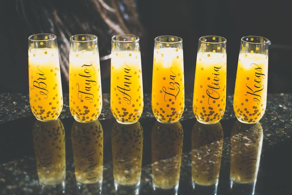 Personalized mimosa glasses for all the bridesmaids.