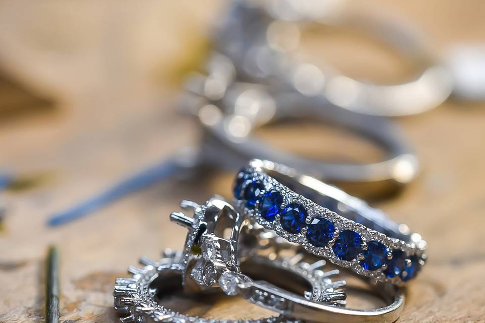 Diamond rings and a sapphire sidestone ring