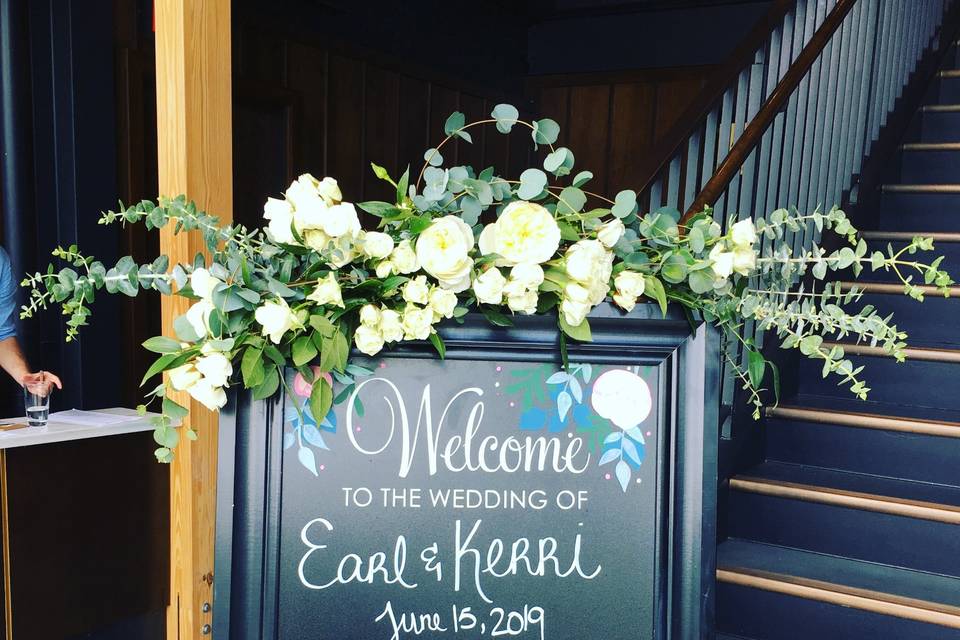 Fresh rose welcome sign