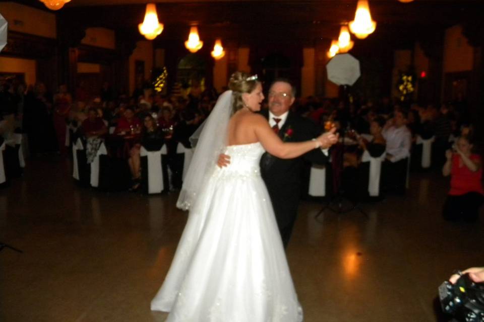 The bride and her father dancing