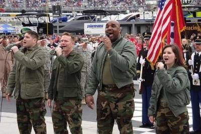Daniel Jens performing with 4TROOPS in front of 150,000 fans at NASCAR race at Brisol Food City 500.