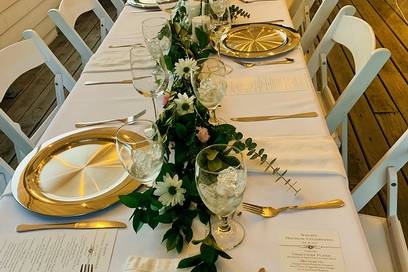Reception setup with gold cutlery