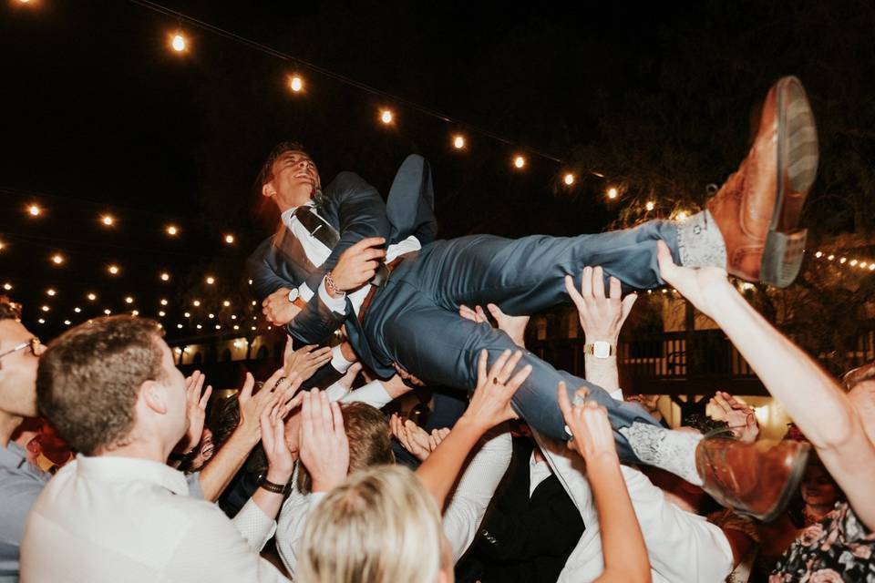 Crowd surfing grooms!