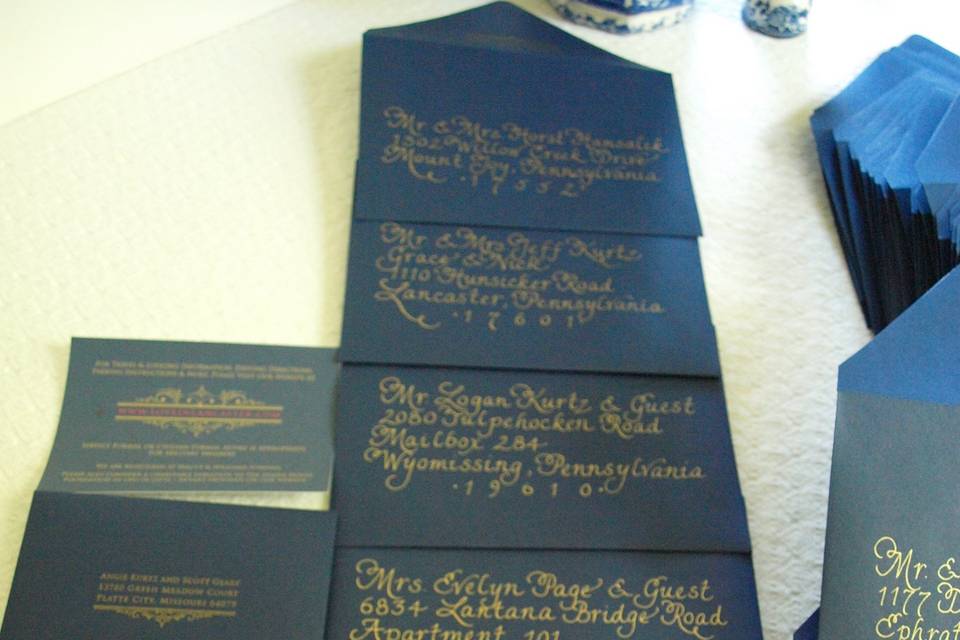 Veterans's Day themed wedding with gold ink on blue envelopes