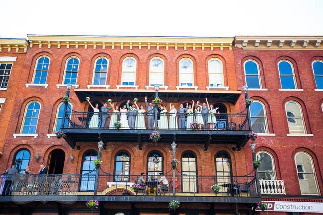 The couple with the bridesmaids and groomsmen