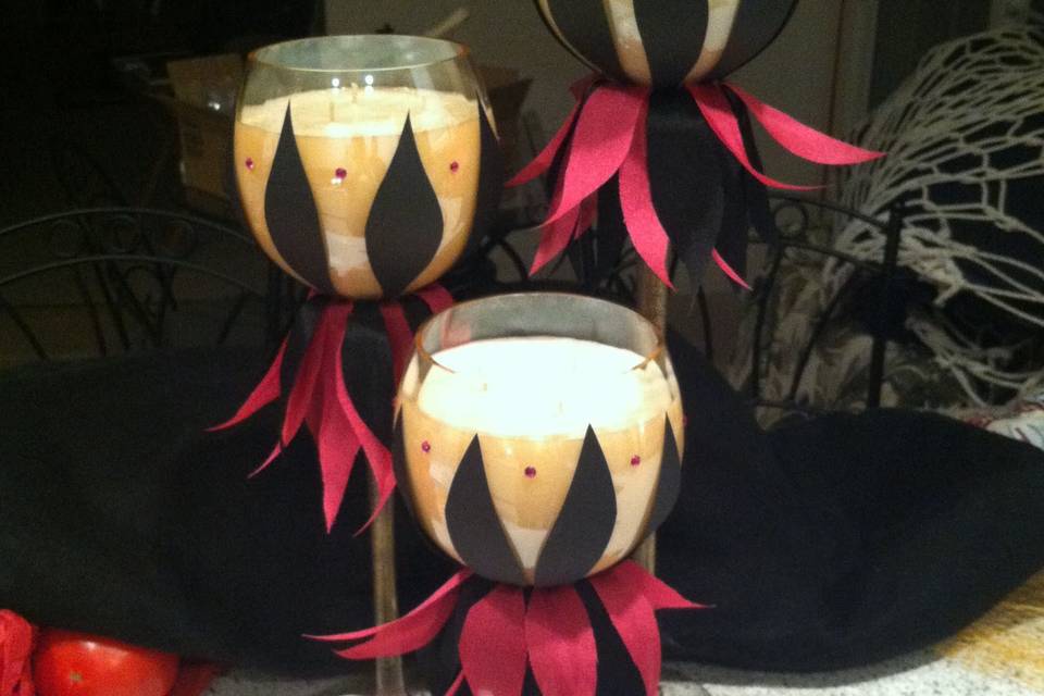 Egyptian Musk - black & fushia cut ribbons with dark pink gems decorate these 3 tier candles.