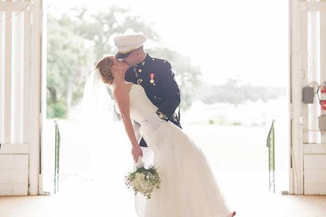 Couple kissing in chapel