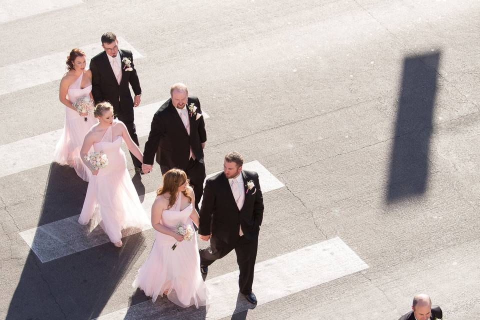 The couple with their bridesmaid and groomsmen